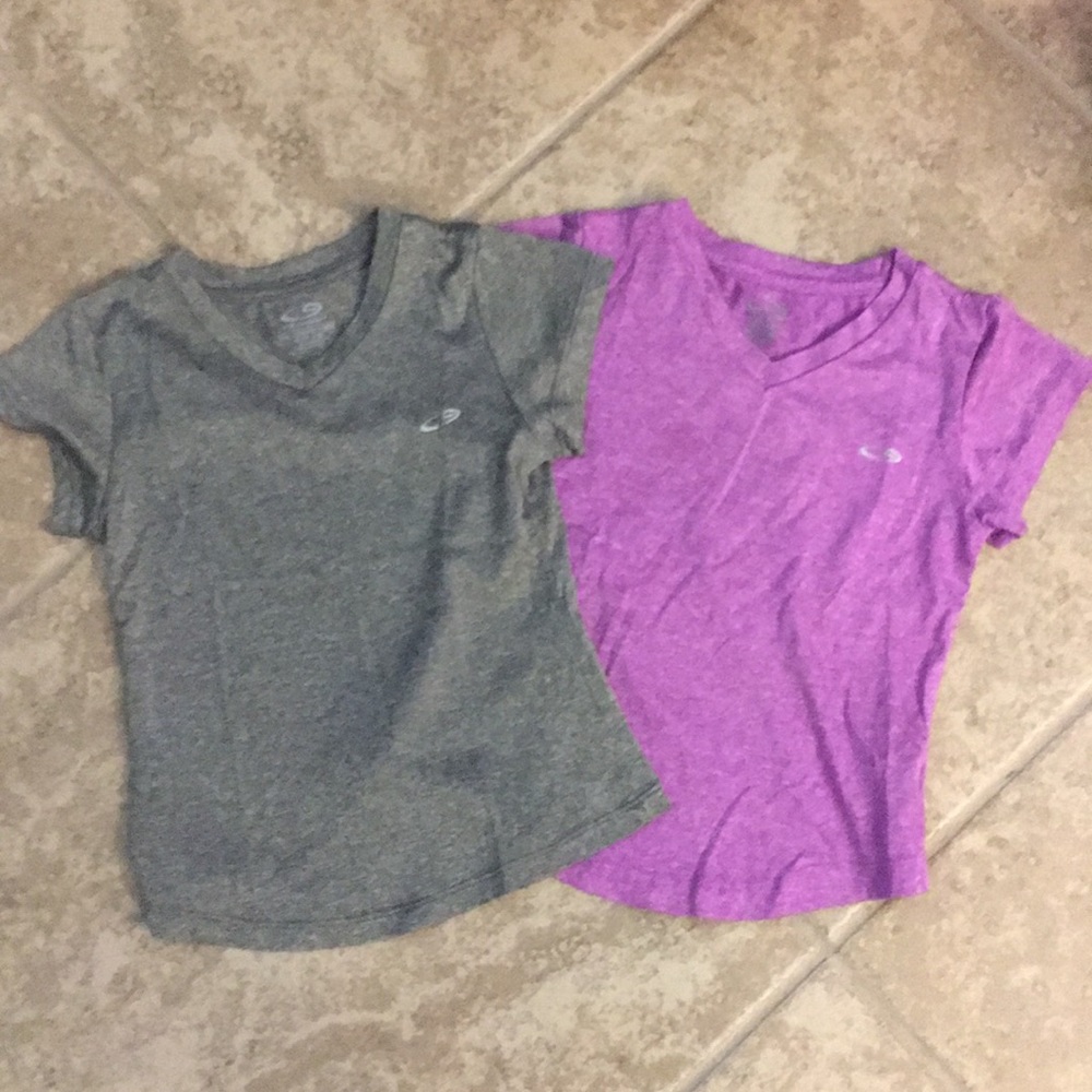 Two girls champion sports shirts